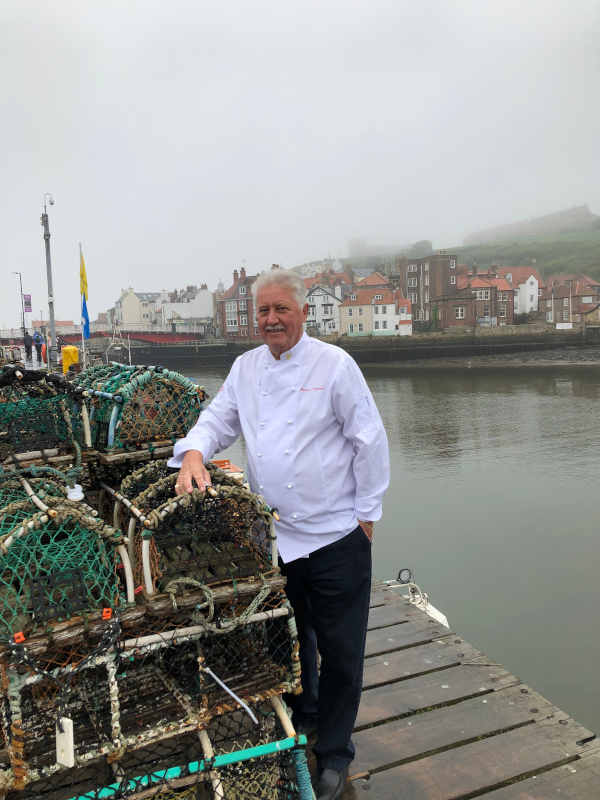 Brian Turner outside The Magpie Cafe in Whitby