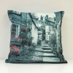 Double-sided Robin Hood's Bay velvet cushion in black and white