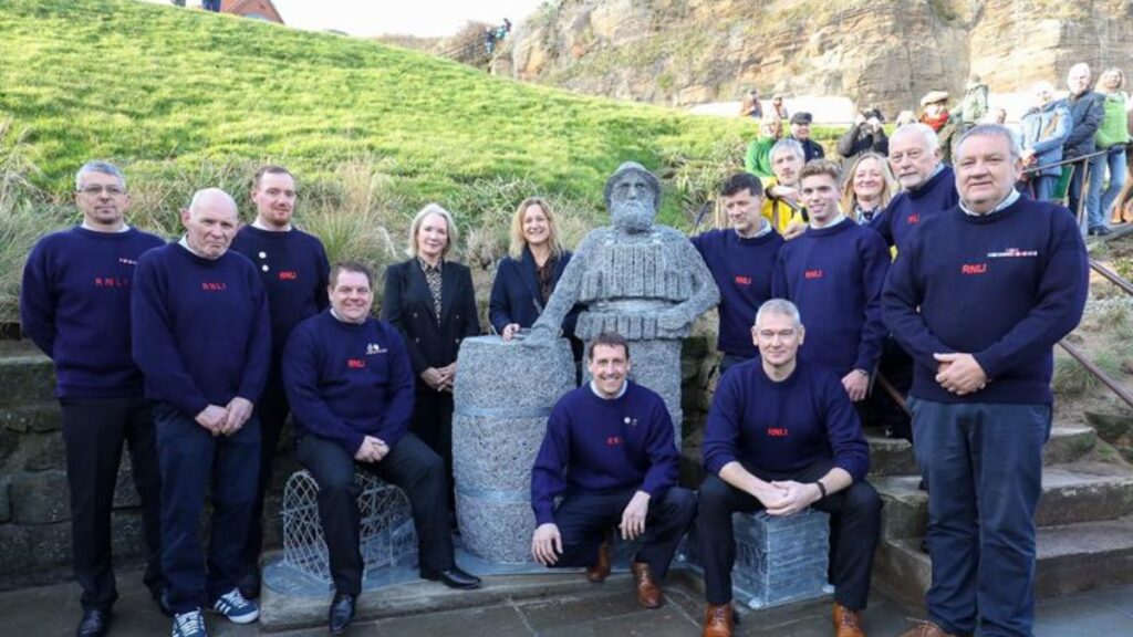Henry Freeman sculpture and RNLI volunteers