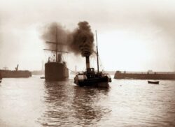 Tug Boat In Whitby Harbour by Frank Meadow Sutcliffe
