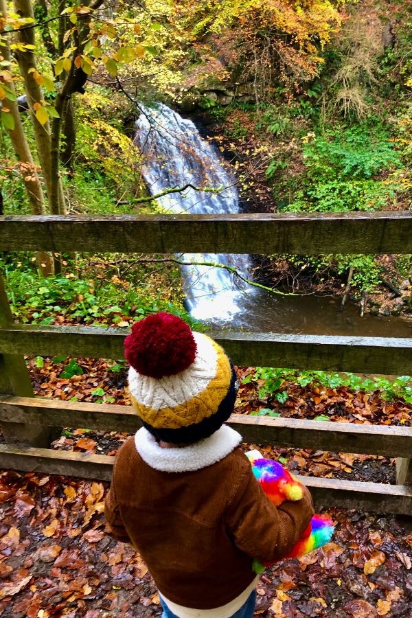 Falling Foss waterfall view from a child. Falling Foss waterfall view from a child.
