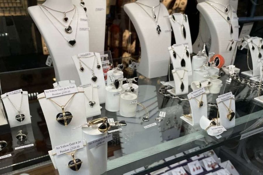Jet jewellery in shop window. Jet jewellery in shop window.