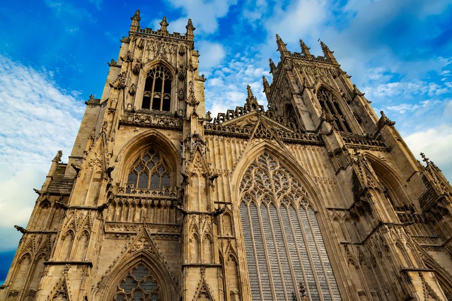 A local legend suggests couples should share a kiss beneath the Great West Window at York Minster.