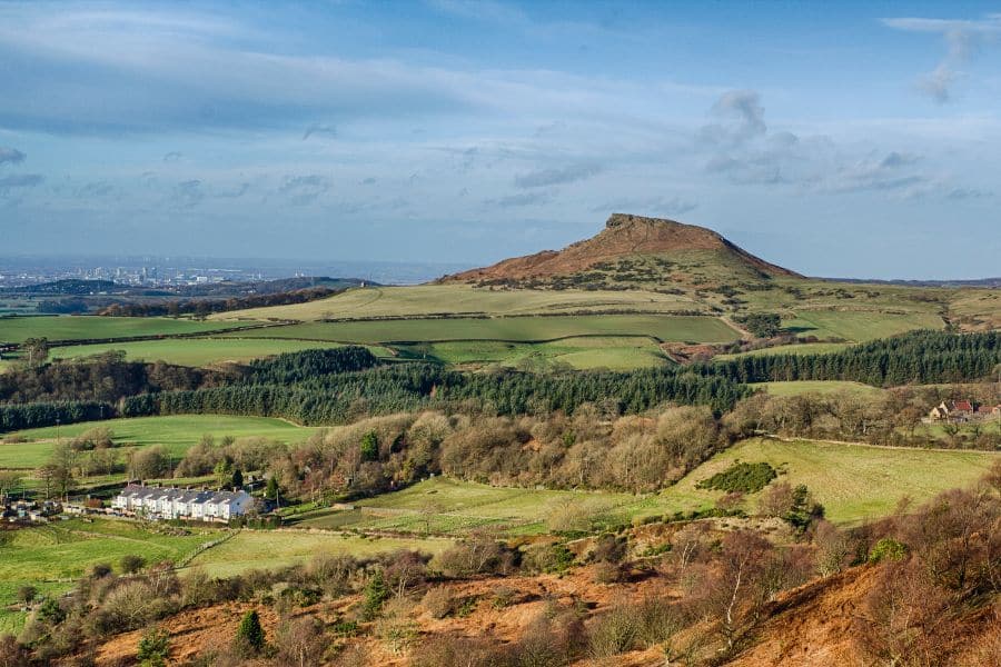 Roseberry Topping in the distance. Roseberry Topping is one of the making Saltburn by the Sea walks you can enjoy.