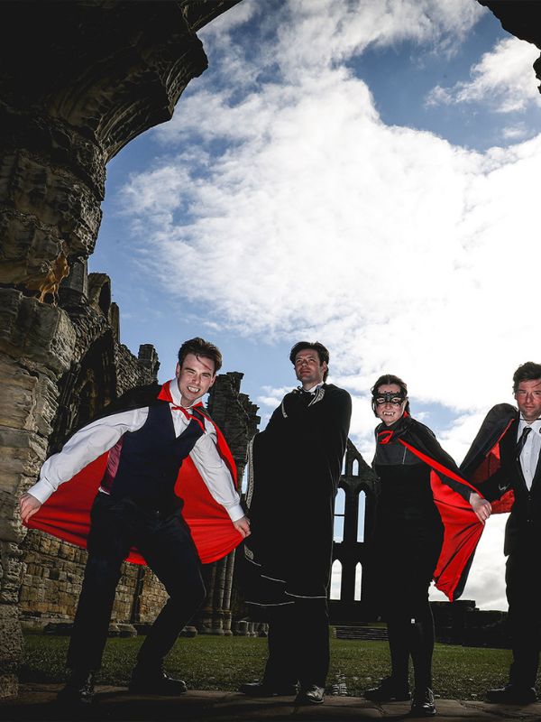 People in Dracula costumes at Whitby Abbey. People in Dracula costumes at Whitby Abbey.