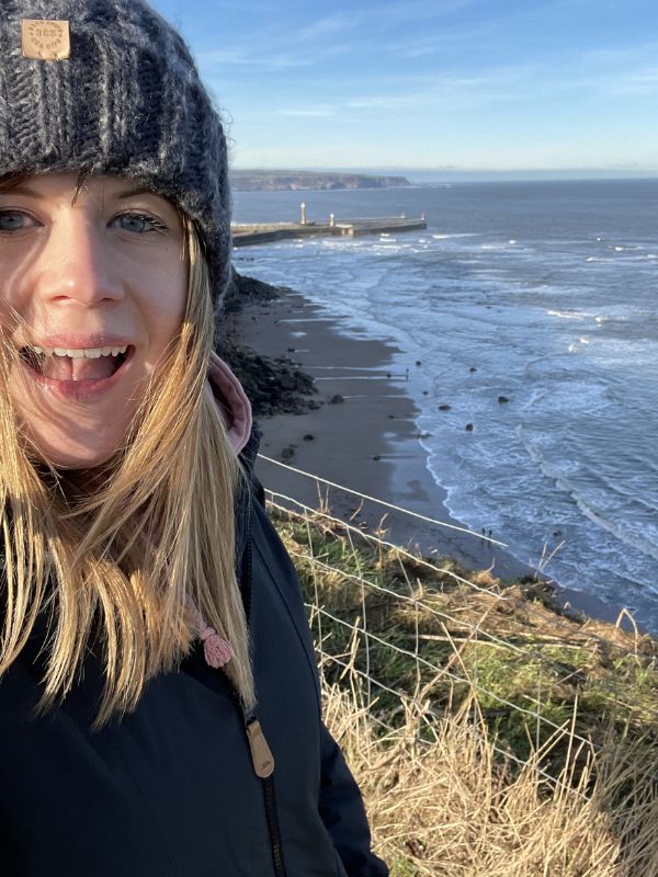 Girl walking to Robin Hood's bay from Whitby.