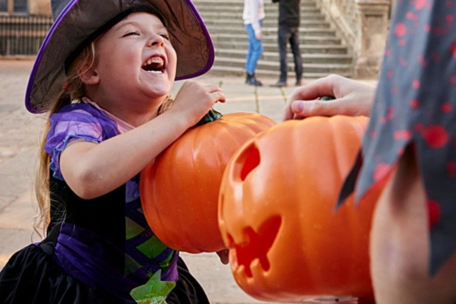Whitby Abbey child at halloween.