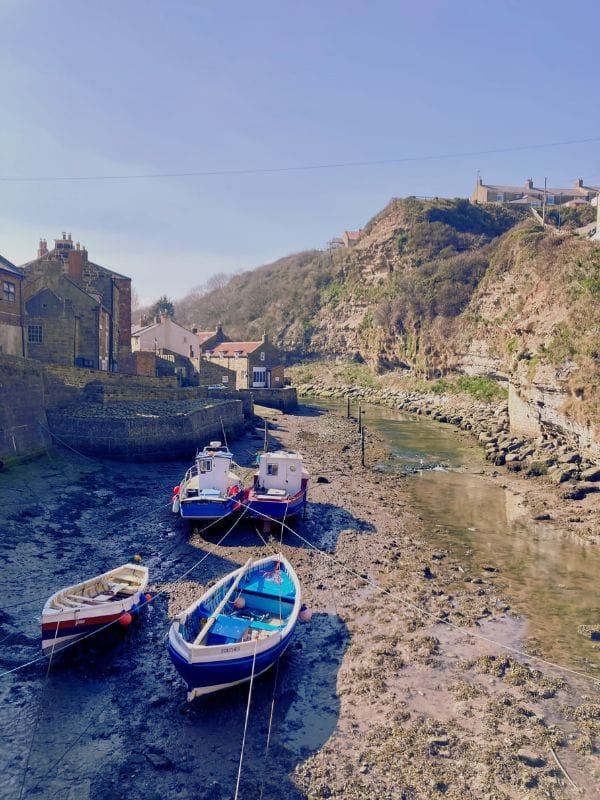 Staithes Boats at low tide in Staithes.