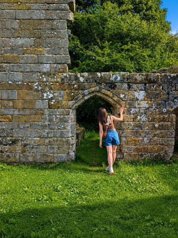 Girl exploring Mulgrave Castle ruins. Girl exploring Mulgrave Castle ruins.