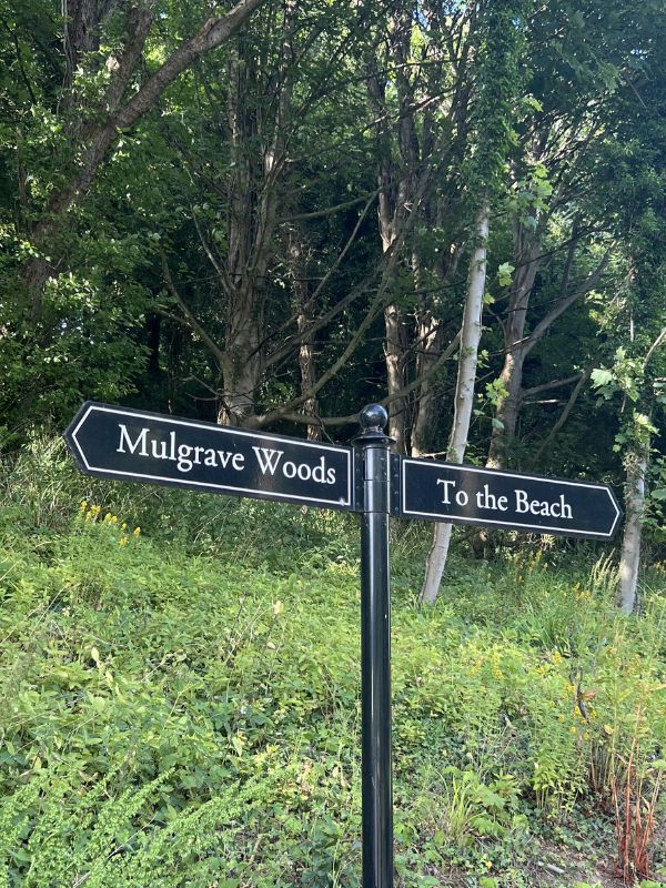 Signpost to Mulgrave Woods or to the beach the other way. Signpost to Mulgrave Woods or to the beach the other way. Start of the Sandsend to Mulgrave Castle Mulgrave Walk.